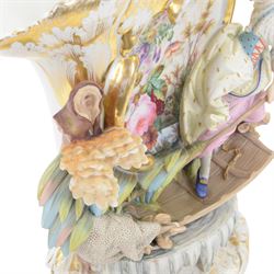 19th century Continental part bisque and glazed porcelain vase, the fan shaped vase hand painted with a floral spray, upon a punt navigated by a female figure, H39.5cm W39cm