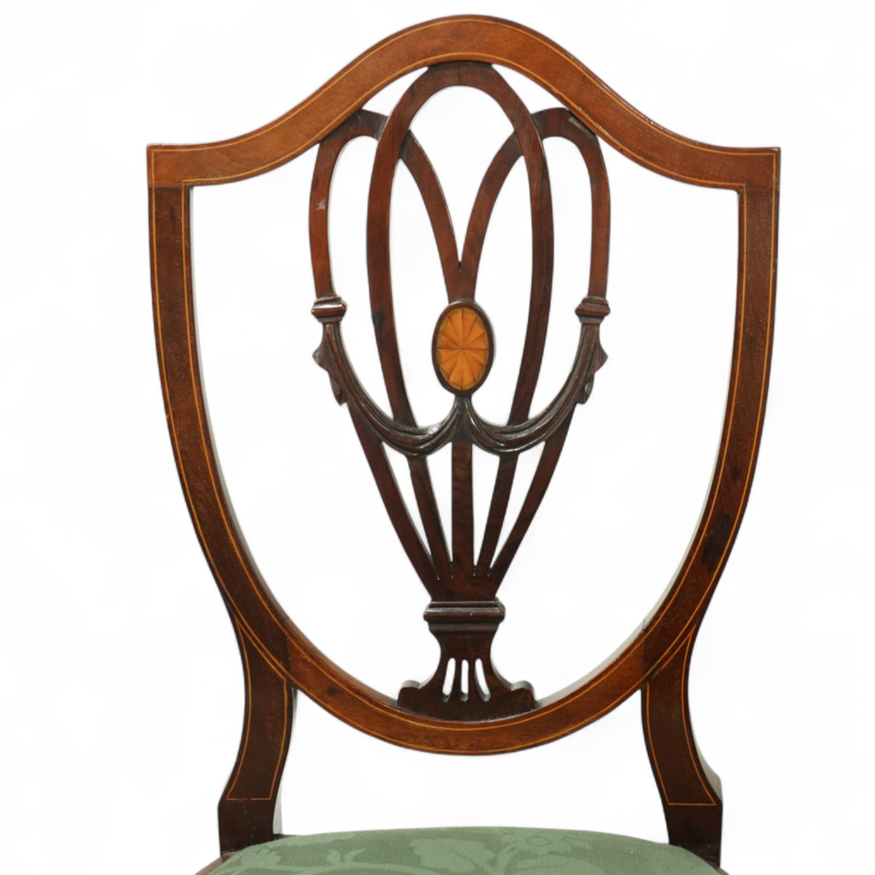 Hepplewhite design mahogany set of ten dining chairs, two carvers and eight dining chairs, with inlaid oval medallion to the vase splat, green upholstered drop-in seats, on square section tapering supports with spade feet, including two carvers