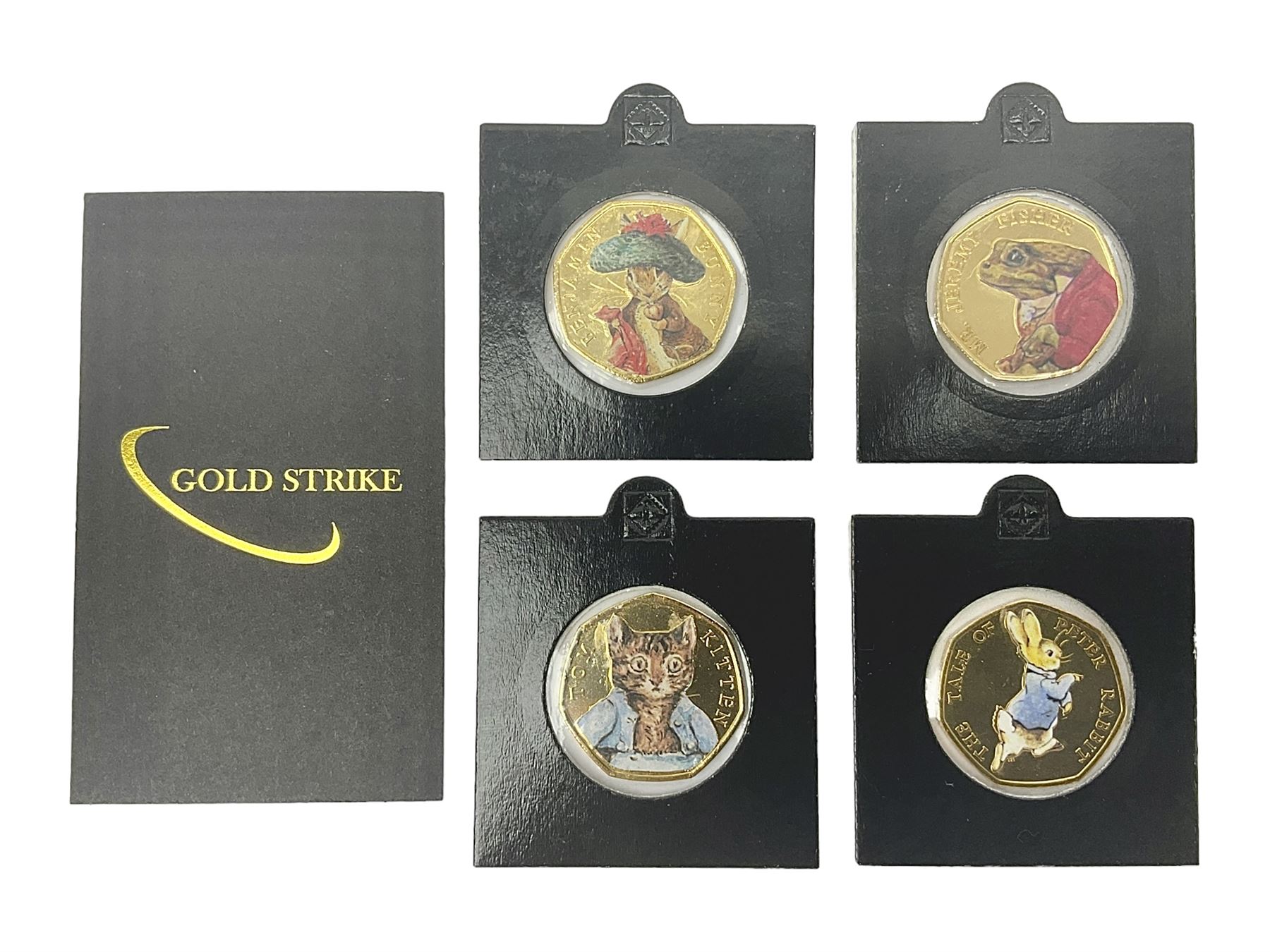 Four gold plated and coloured commemorative fifty pence coins, comprising 2017 Benjamin Bunny, Mr Jeremy Fisher, Tom Kitten and The Tale of Peter Rabbit, with Gold Strike certificate of authenticity