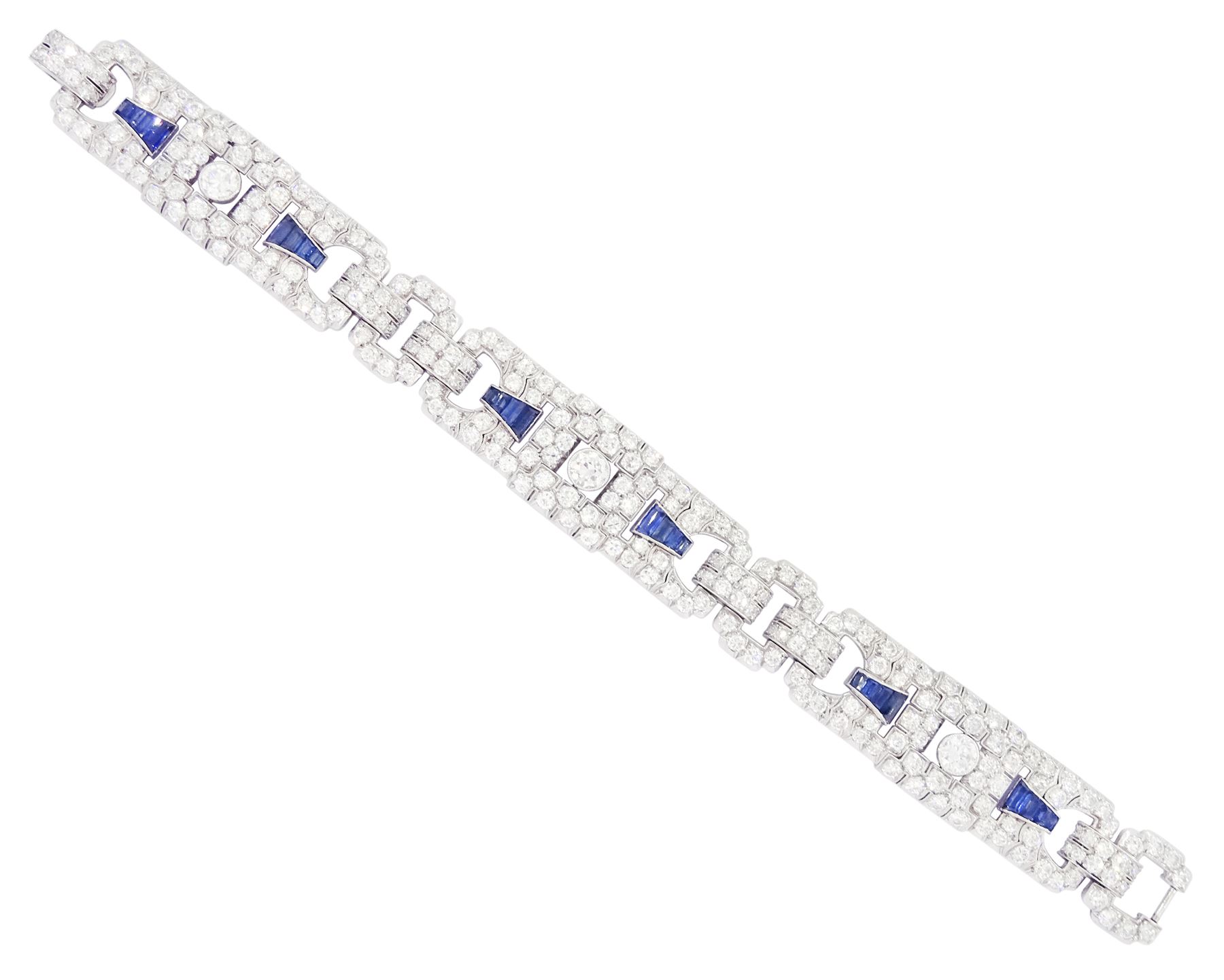 Art Deco platinum milgrain set old cut diamond and calibre cut Burmese sapphire link bracelet, the three principal diamonds each approx 0.50 carat, total diamond weight approx 13.00 - 14.00 carat, stamped Pt, circa 1925, in fitted box by Licht & Morrison, London