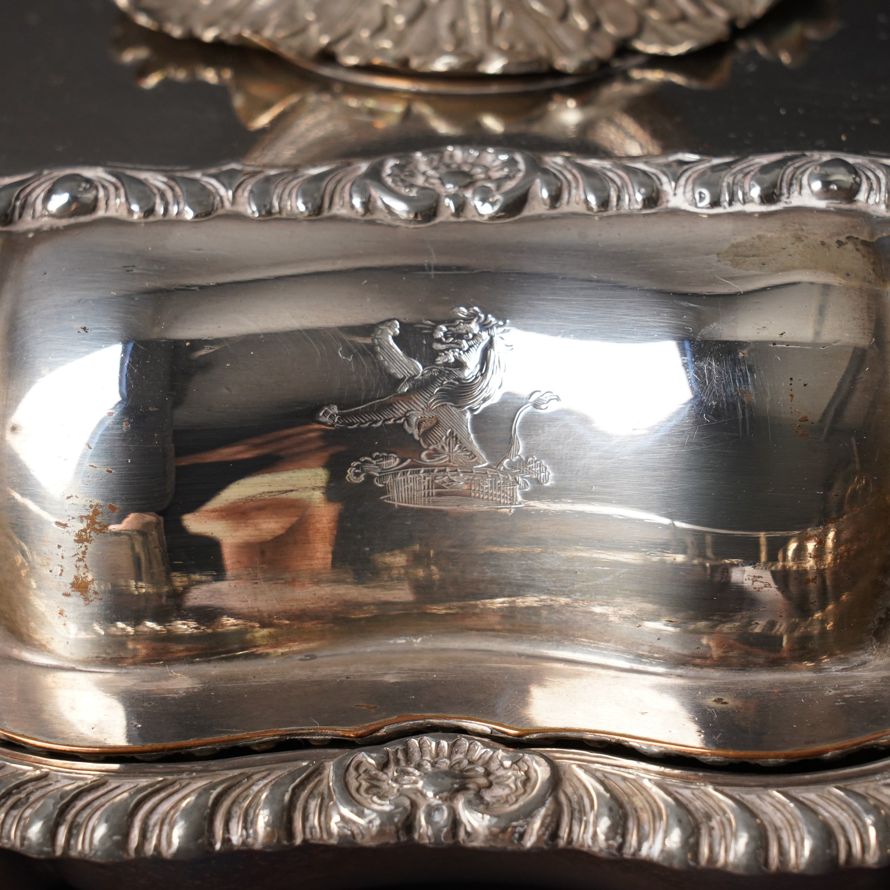 Pair 19th century silver plated entree dishes and covers with gadrooned and shell moulded borders and loop handles engraved with a crest and another similar