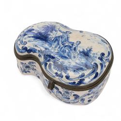 Two 19th century porcelain trinket boxes, comprising blue and white Delft example with courting scene to cover and a Meissen style example, hand painted with floral sprays on a blue scale ground, tallest H4.5cm 