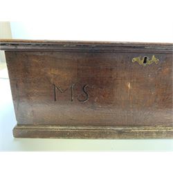 18th century oak chest, the hinged cover with applied mould above front with carved detail 'M.S. 1770', with moulded skirt base, H27cm L72cm D37cm
