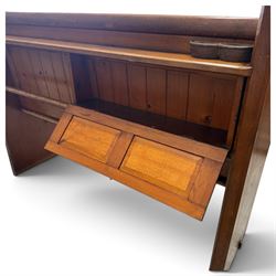 Early 20th century stained pine ecclesiastical church pew, the shaped end supports flanking slatted and panelled back, with black stencilled number '17' to the side