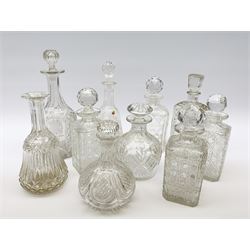 A group of various cut and moulded glass decanters, to include a pair with octagonal hob nail cut decoration, plus a matched example, each approximately H22.5cm, the other example of various form including square, mallet, bulbous, etc. 
