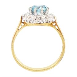 18ct gold blue zircon and diamond cluster ring, single round cut blue zircon surrounded by ten single cut diamonds, London 1965