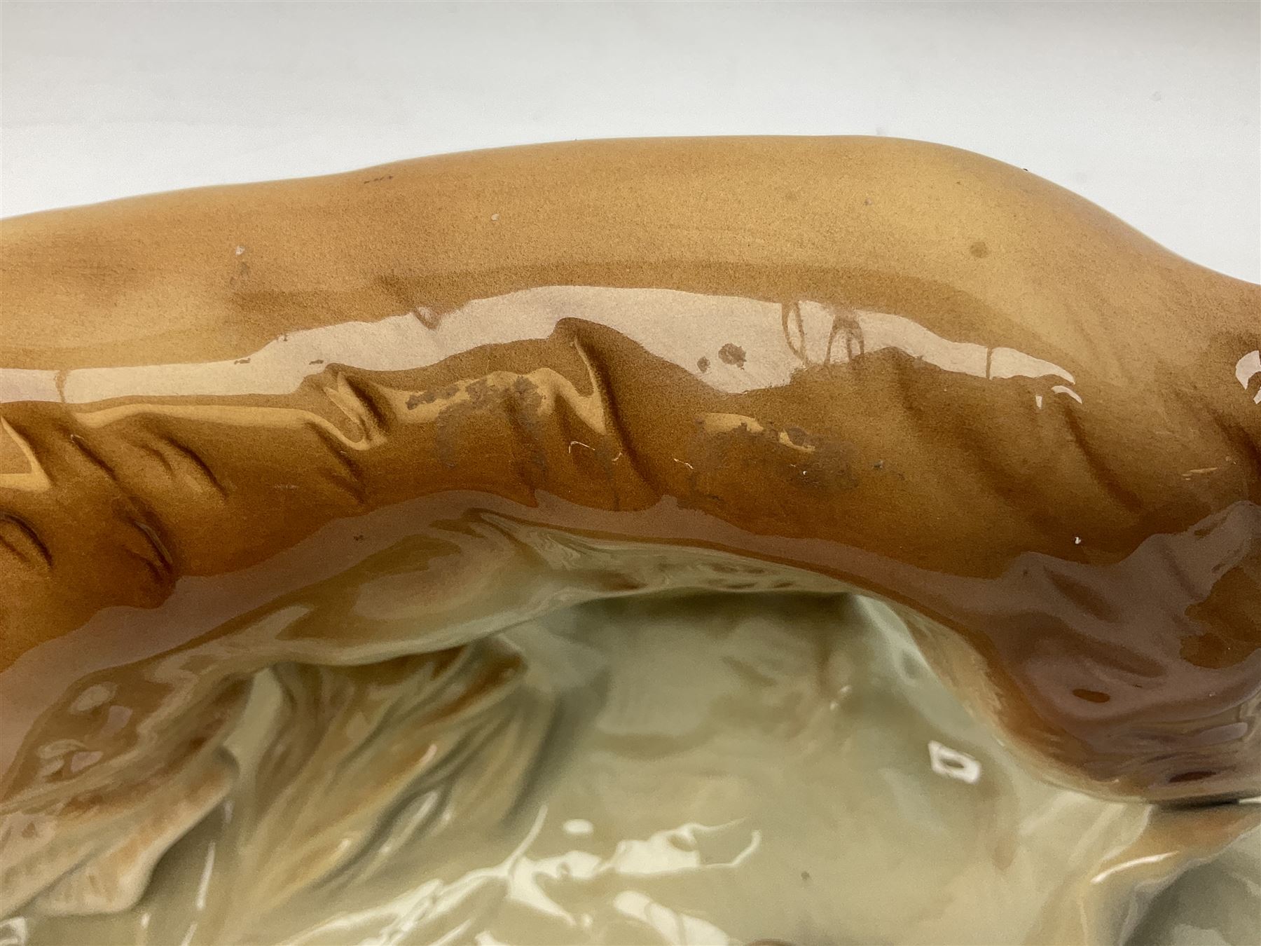 Royal Dux porcelain hunting dog with a bird, printed mark beneath, L36cm