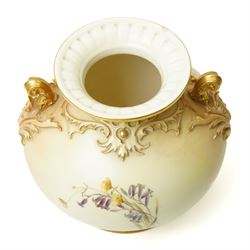 Late Victorian Royal Worcester vase of baluster design with gilt handles and painted with flowers on a blush ivory ground H22cm, date code for 1892