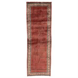 Botehmir Persian wool runner, hand knotted, brick red background with repeating diamond-sh...