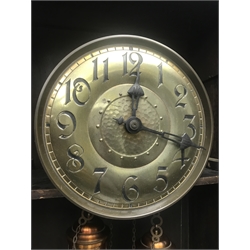Early 20th century oak longcase clock, eight day movement striking on a coil, circular Arabic dial with embossed decoration, full length hinged door with bevel glass panels, H212cm (two weights, no pendulum) 