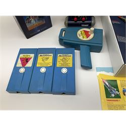 Matchbox 'The Thunderbirds' limited edition Commemorative Set, boxed with paperwork; Tomy 'Mr. D.J.' blue plastic robot radio; Mettoy Walt Disney Movie Viewer with three cassettes; and 1995 boxed set of the Star Wars trilogy VHS video tapes
