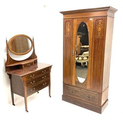 Edwardian inlaid mahogany wardrobe, projecting cornice above, single cupboard door with oval bevel edge mirror above single long drawer, raised on plinth base (W101cm, D47cm, H194cm), together with matching dressing table, (W92cm, D50cm, H150cm)