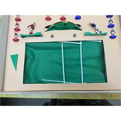 Subbuteo - three boxed sets comprising Football Express with two five-a-side teams and floodlighting; Continental with four teams and accessories; and International Edition Table Rugby with two teams; together with a Real Madrid 1974-75 League Champions pennant (4)