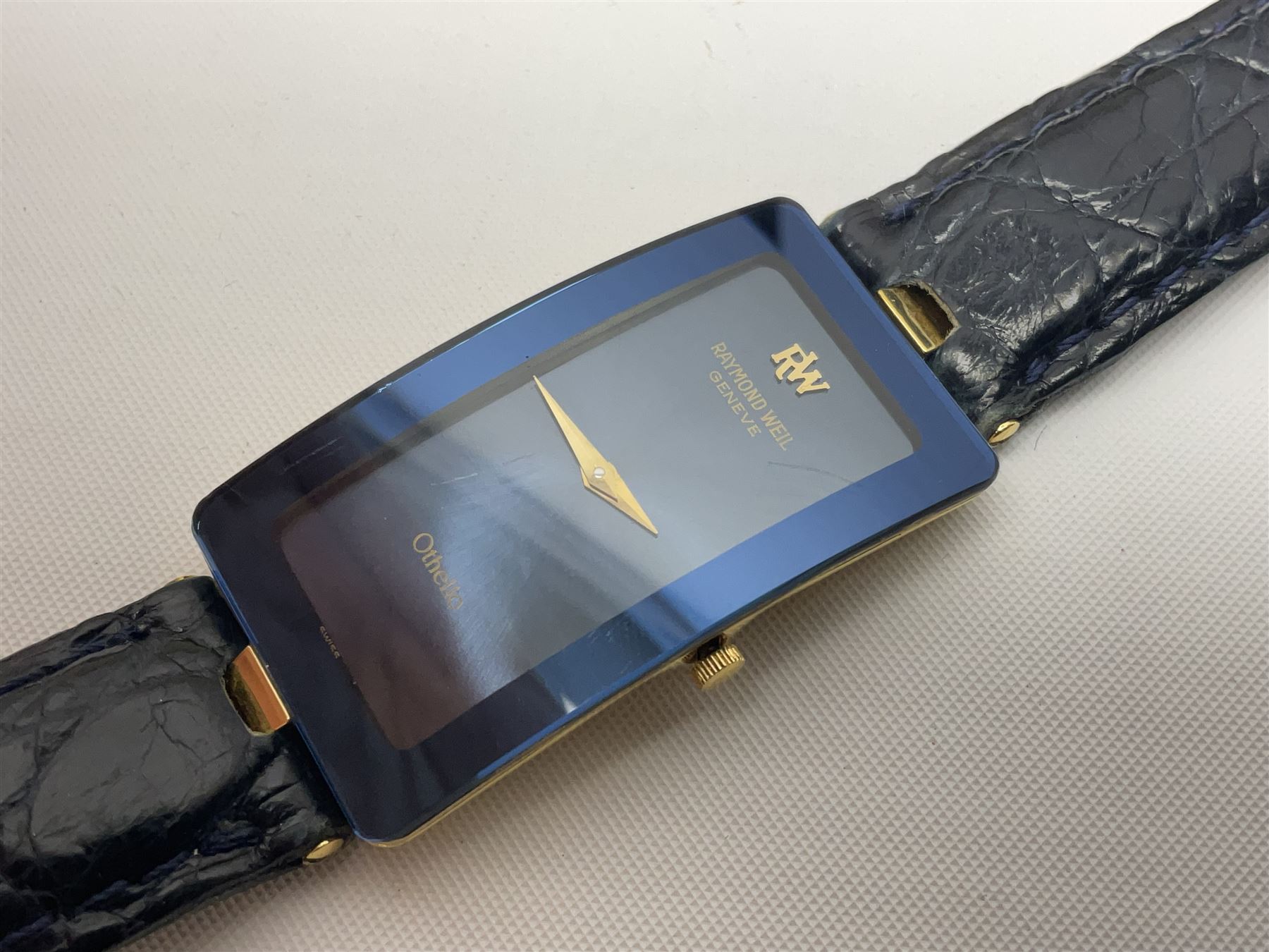Raymond Weil ladies 'Othello' wristwatch, the rectangular 18ct gold plated case with blue enamel dial, on a Raymond Veil navy blue crocodile leather strap, in original box