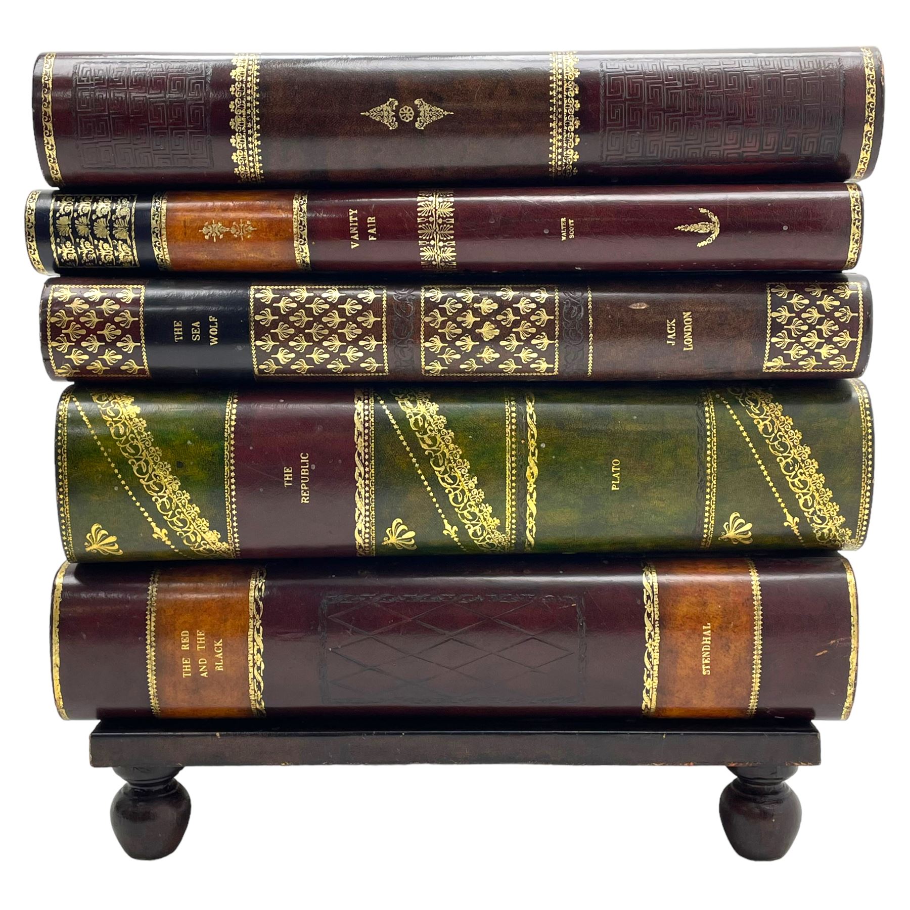 Maitland-Smith - four drawer chest in the form of a stack of leather-bound books, the top drawer with metal label inscribed 'Maitland-Smith', on turned feet