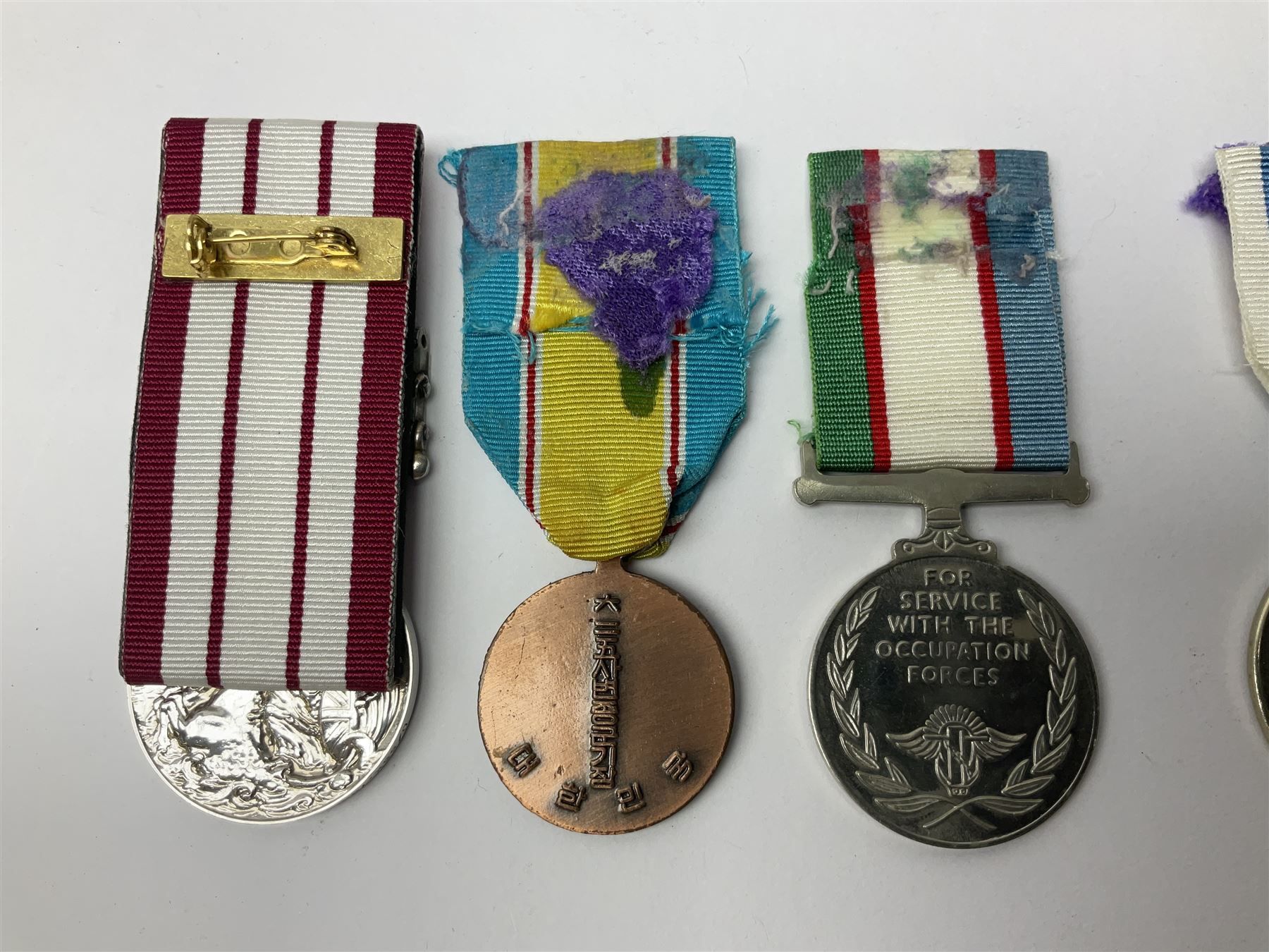 1949 Yangtze Incident HMS Consort casualty Naval General Service Medal with two clasps for Yangtze 1949 and Malaya awarded to D/SSX. 788562 J. Tootell A.B.R.N.; with four other medals comprising Republic of Korea War Service Medal, Eastern Service Medal, unofficial British and Commonwealth Occupation Forces Association Occupation of Japan medal and IFKVWA 40th Anniversary Medal; together with an archive of contemporary and later related items including Certificate of Service 1946-54, Recommendations for Advancement and Conduct Record Sheet 1946-53, Quartermasters History Sheet 1949-53, Destroyer Association China Station 1945-53 beret, later manuscript journal with his own account of the Yangtze incident etc, Joe's birth certificate details dated 1968, reprinted half-length portrait in uniform, Manual of Seamanship 1937, modern shield and framed crests, blazer badges and metal badges and a copy of Loyal & Steadfast - The Story of HMS Consort 2008, which gives details of how Joe Tootell received his wounds, the extract reads ' When Consort came under fire a short time later it was a strange, perhaps unreal experience for many of the crew who had never seen action before. Ordinary Seaman Joe Tootell was in the wheelhouse. 'I could not see the action. We could hear the ship taking severe punishment. When the wheelhouse took a direct hit, killing the coxwain, Chief Petty Officer Gurney, and myself receiving multiple shrapnel wounds, the steering mechanism was put out of action.'