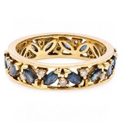 18ct gold sapphire and diamond full eternity ring, sixteen marquise cut sapphires, each spaced by a round brilliant cut diamond, London import mark 1992