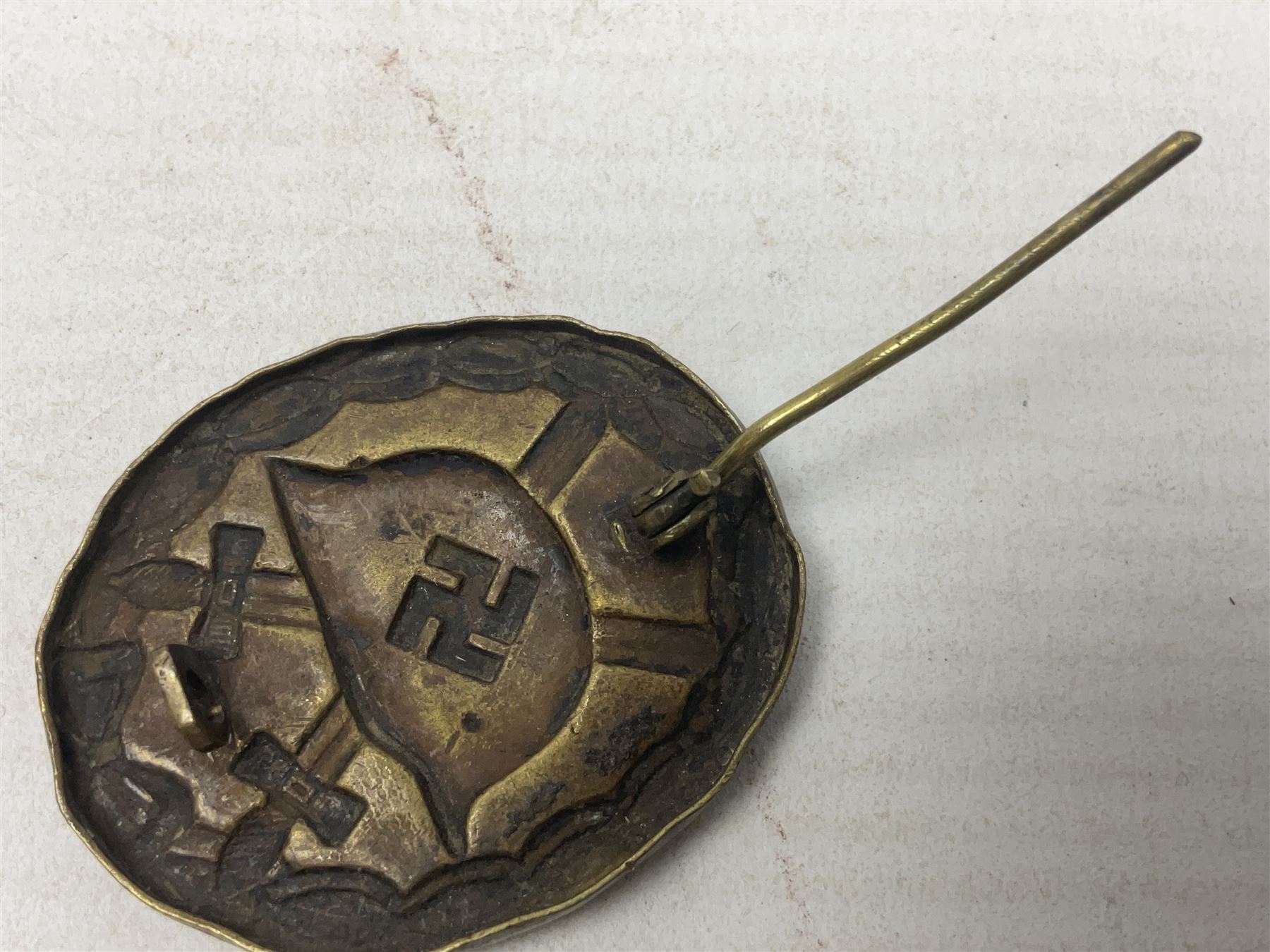 Three WW2 German badges - Close Combat Clasp; Army Flak badge; and Wound badge