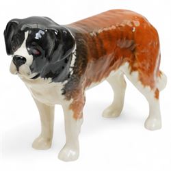 Six Beswick dogs comprising St Bernard No.2221, Greyhound No.972, Alsatian No.969. Whippet No.1786B, Cairn No.1055A and Retriever No.1855, two Beswick foxes and a harnessed horse