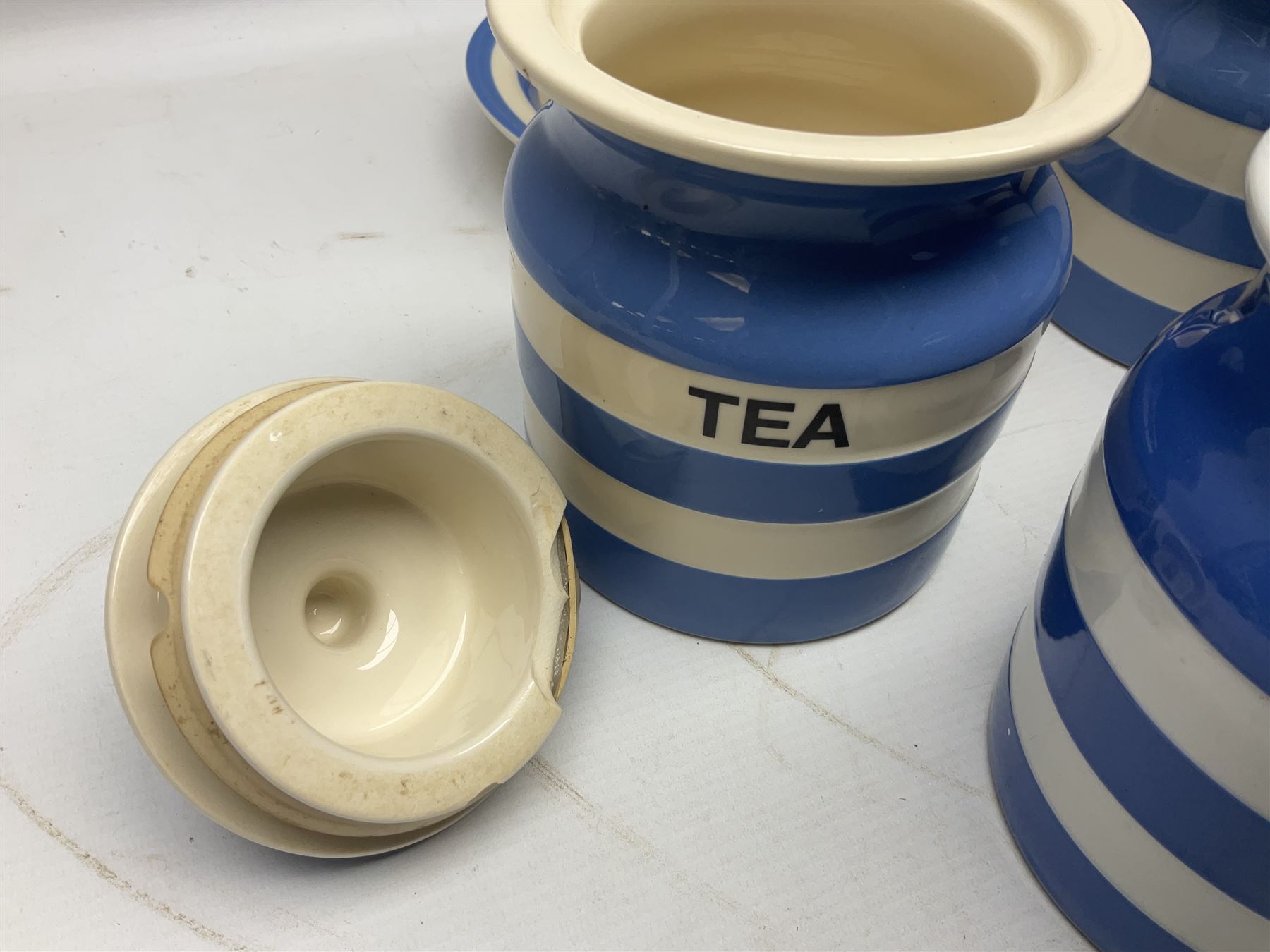 TG Green Cornish kitchen ware, to include coffee pot, pint milk jug, nine storage jars for various items, four dinner plates, etc (25)