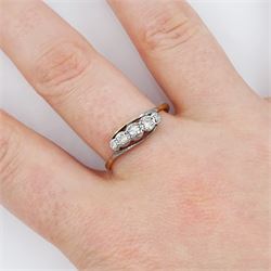 18ct gold illusion set, five stone diamond ring, stamped
