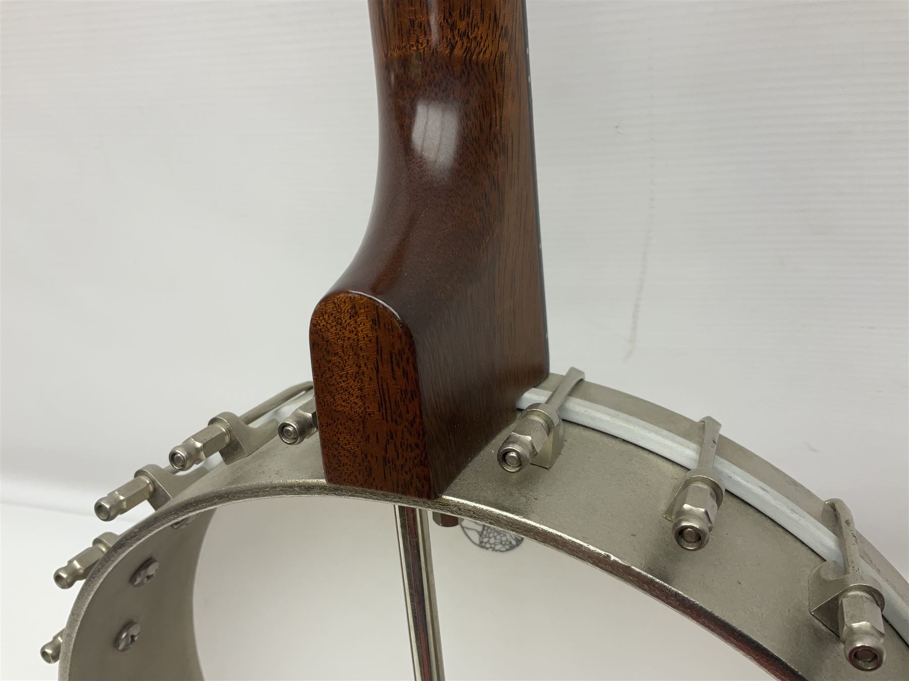 Deering seventeen-fret tenor banjo with cast metal body, serial no.H275, L79cm overall; in fitted hard carrying case