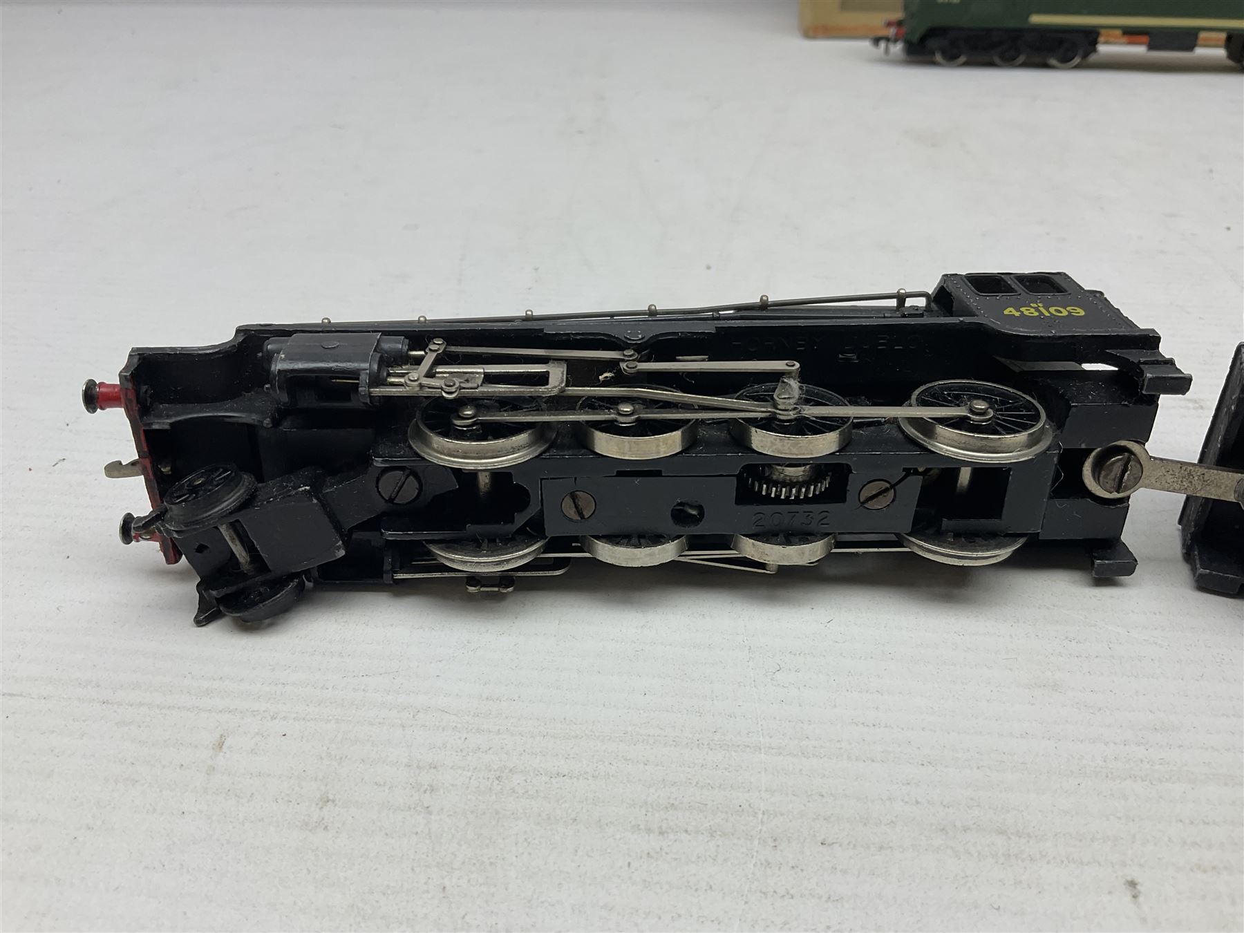 Hornby Dublo - 2-rail - Class 8F 2-8-0 locomotive No.48109 in BR black; Class R1 0-6-0 tank locomotive No.31337 in BR black; and Met-Vic Diesel Co-Bo locomotive No.D5702 in BR green; together with 3-rail Class 4MT Standard Tank 2-6-4 locomotive No.80054 in BR black; three unassociated boxes and one unboxed (4)