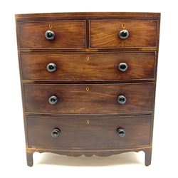 Early 19th century mahogany bow front chest, fitted with two short and three long drawers
