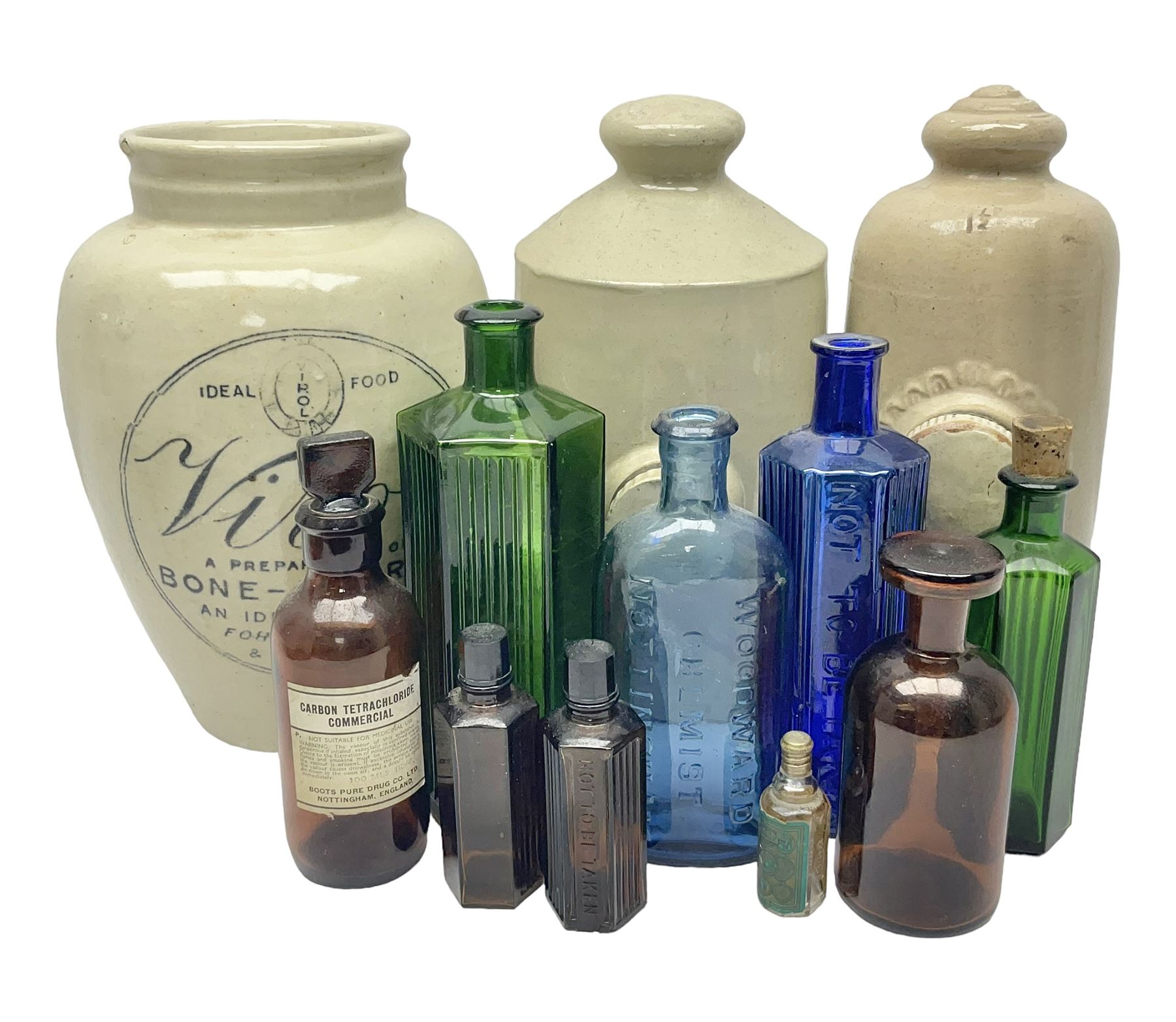 Virol bone marrow stoneware jar, two stoneware hot water bottles and a collection of small apothecary bottles to include amber and green glass examples, some with stoppers and labels, jar H24cm