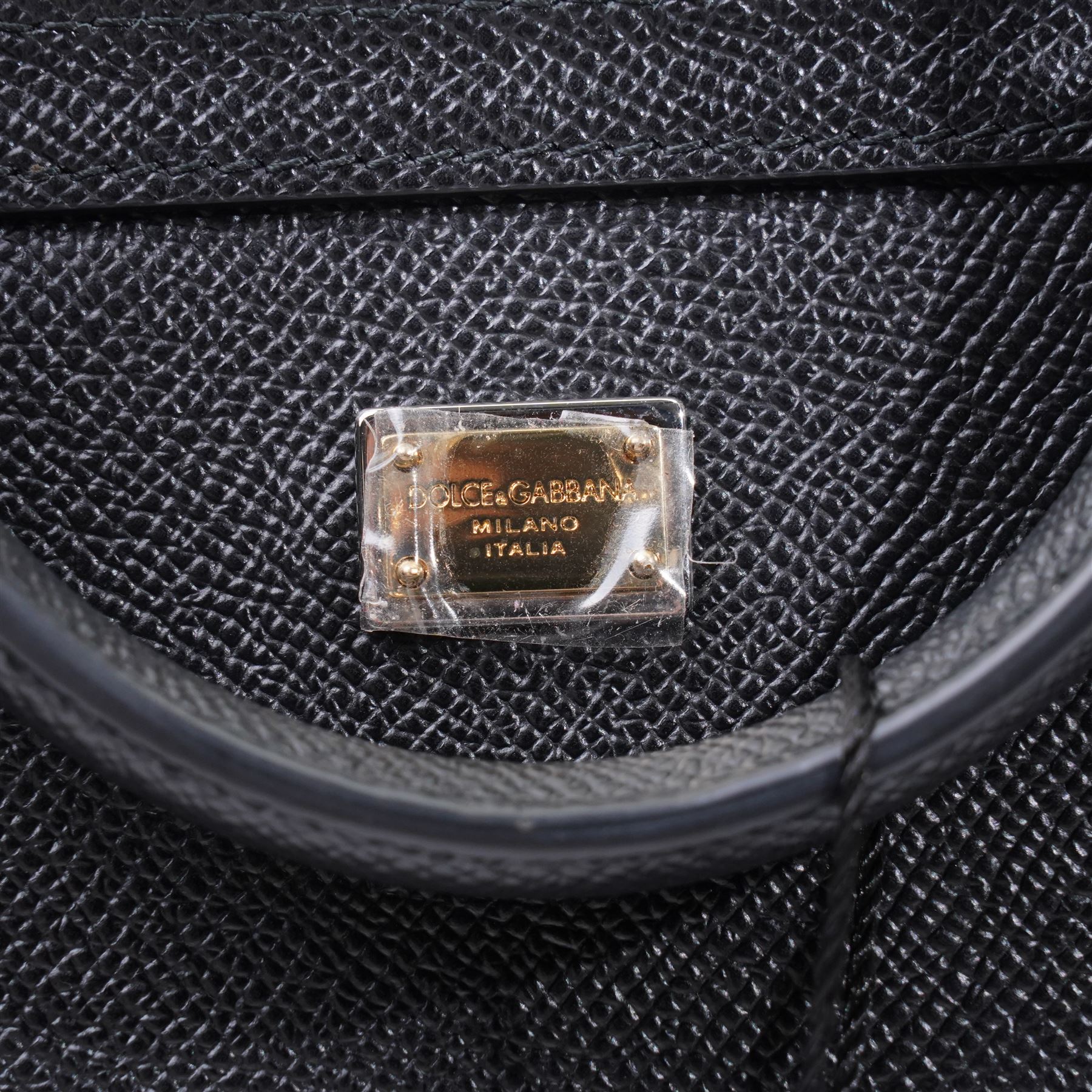 Dolce & Gabbana - 'Sicily Clock’ Medium Bag, from the Fairytale collection (Autumn/Winter 2016), in structured black textured leather, the front elaborately applied with a jewelled clock-face motif and floral embellishments, with top handle and detachable shoulder or crossbody strap, a limited production piece, unused with original box and dust bag