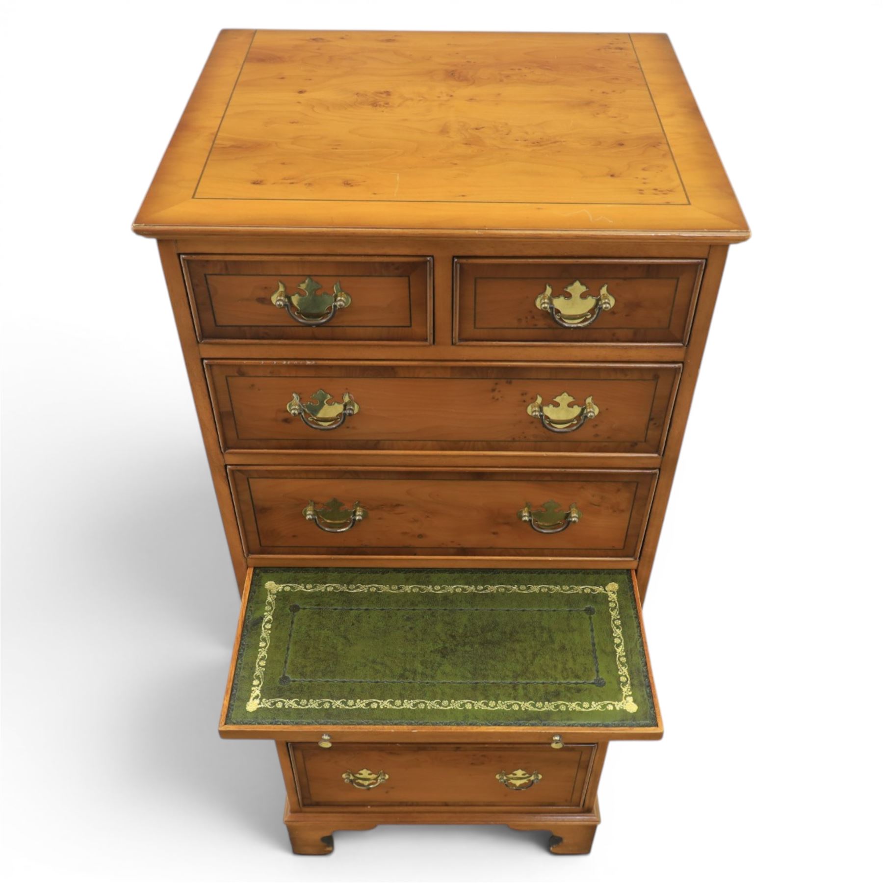 Georgian design yew wood pedestal chest, fitted with seven drawers and slide, brass drop handles