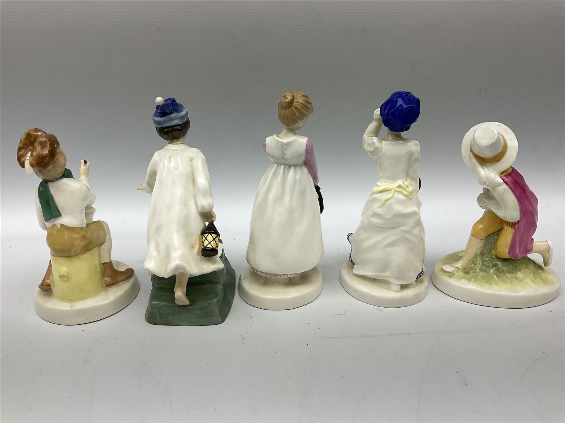 Seven Royal Doulton figures from the Nursery Rhymes Collection comprising, Tom Tom, the piper's son HN3032, Little Jack Horner HN3034, Wee Willie Winkie HN3031, Polly, put the kettle on HN3021, Little Bo-peep HN3030, Little Boy Blue HN3035, Little Miss Muffet HN2727, together with two Royal Doulton Mary had a little lamb figures HN2048 and COPR1948, all with printed marks beneath  