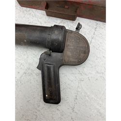 Antifyre Pistole fire extinguisher grenade launcher together with four cartridges (one lacking contents) in original storage tin, together with a red painted fire bucket