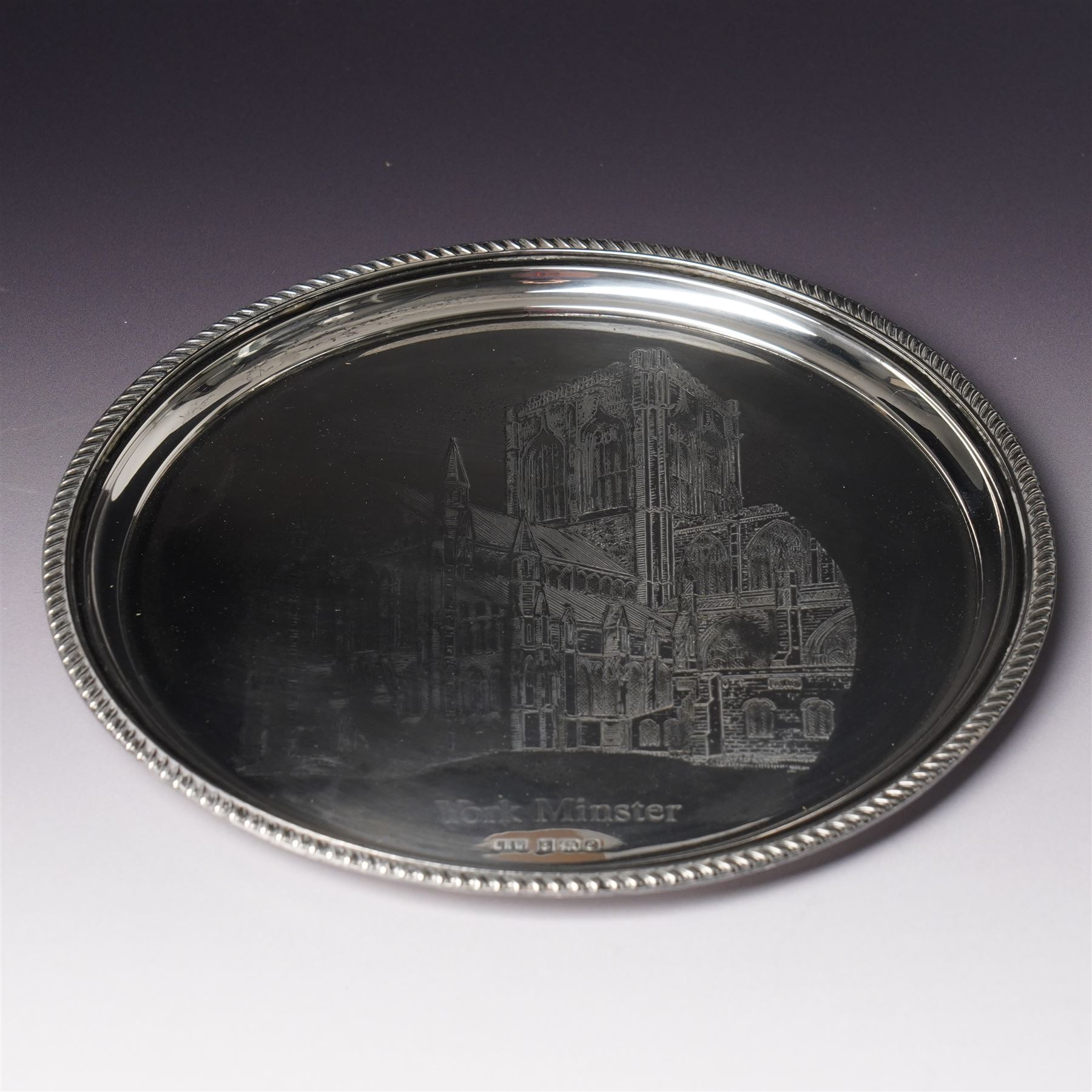 Silver circular York Minster salver with gadrooned border engraved with a view of the Minster in case D21cm Birmingham 1979 Maker Laurence Watson & Co