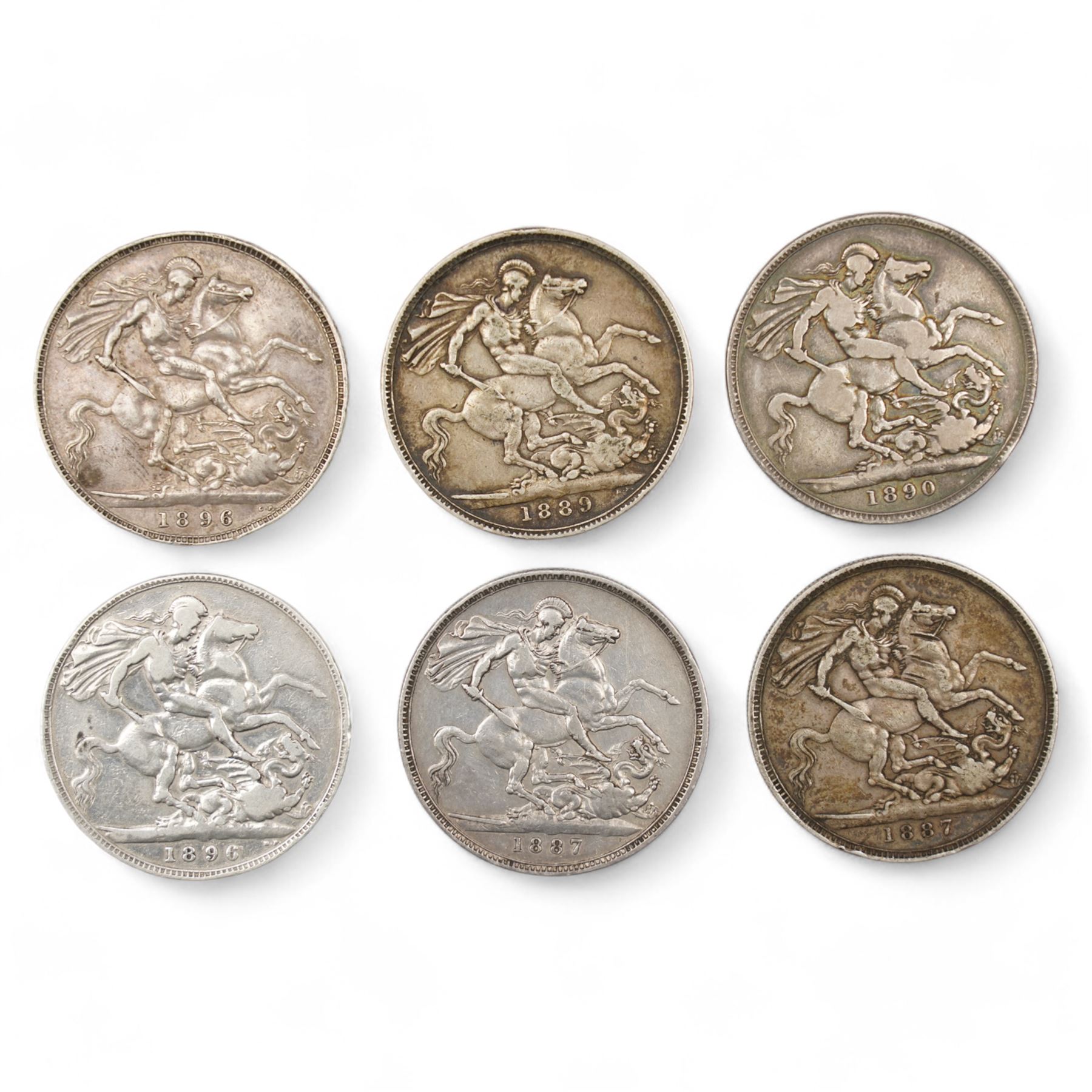Six Queen Victoria silver crown coins, dated two 1887, 1889, 1890 and two 1896
