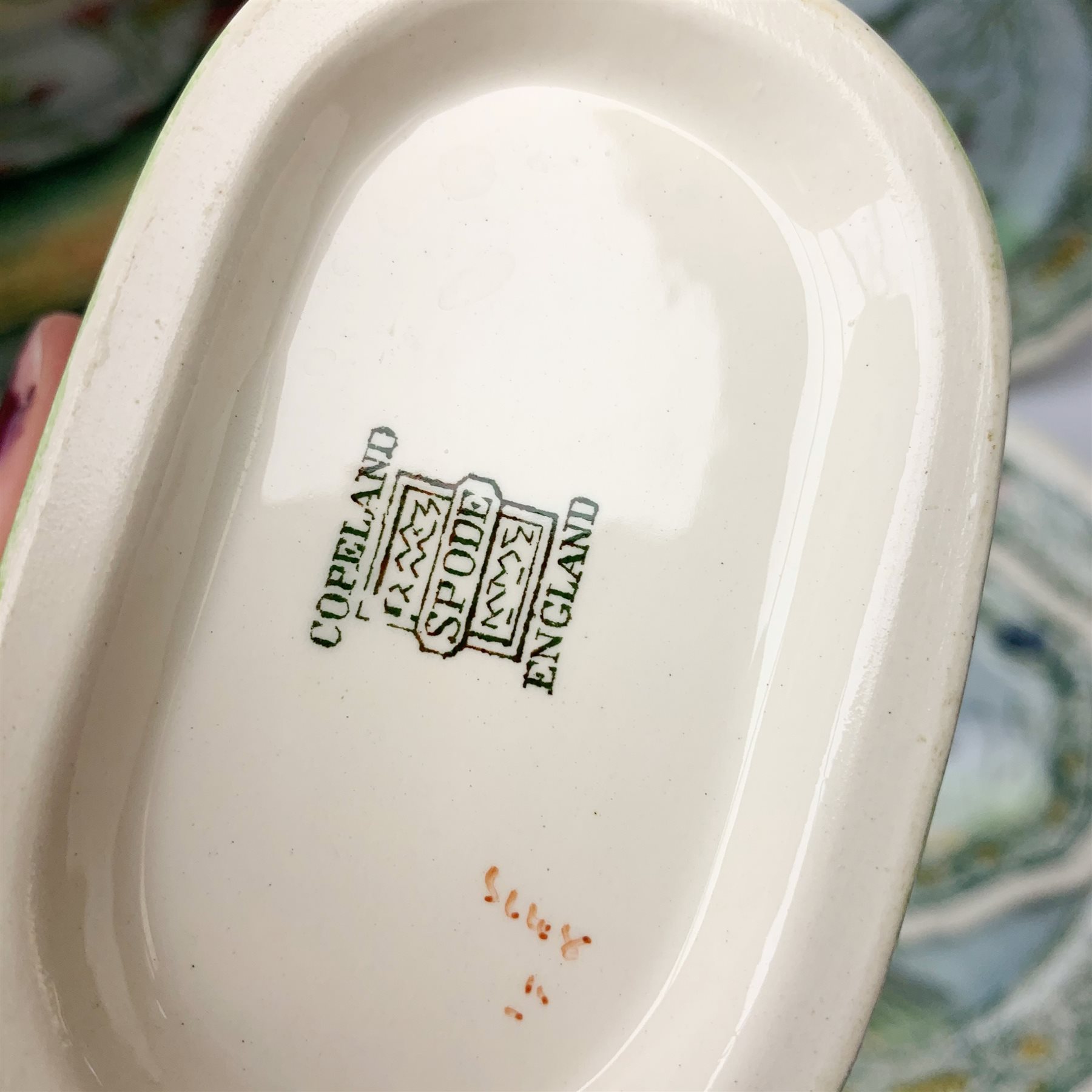 A Copeland Spode fish service, comprising twelve plates, oval serving platter, tureen and cover and sauce jug and stand, platter L46.5cm.