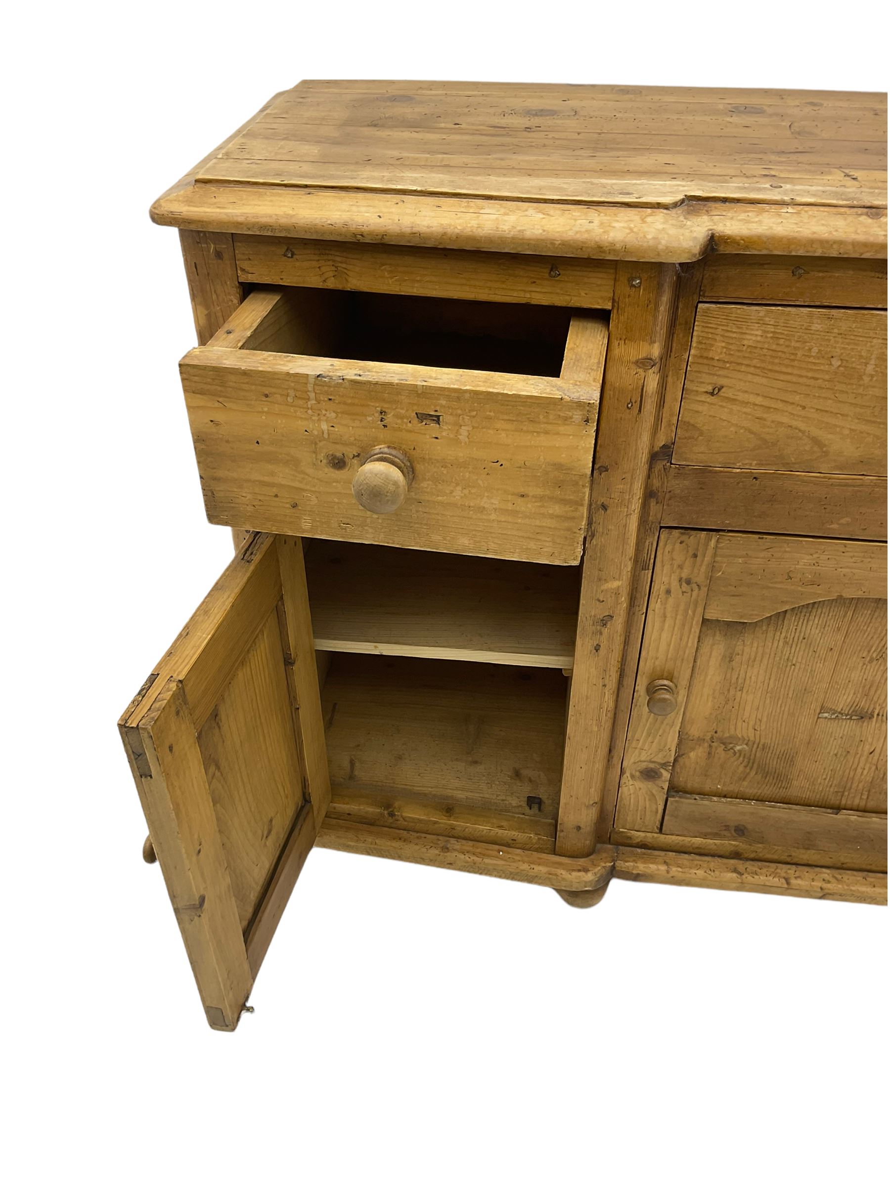 Stripped pine dresser, fitted with three drawers and three cupboards