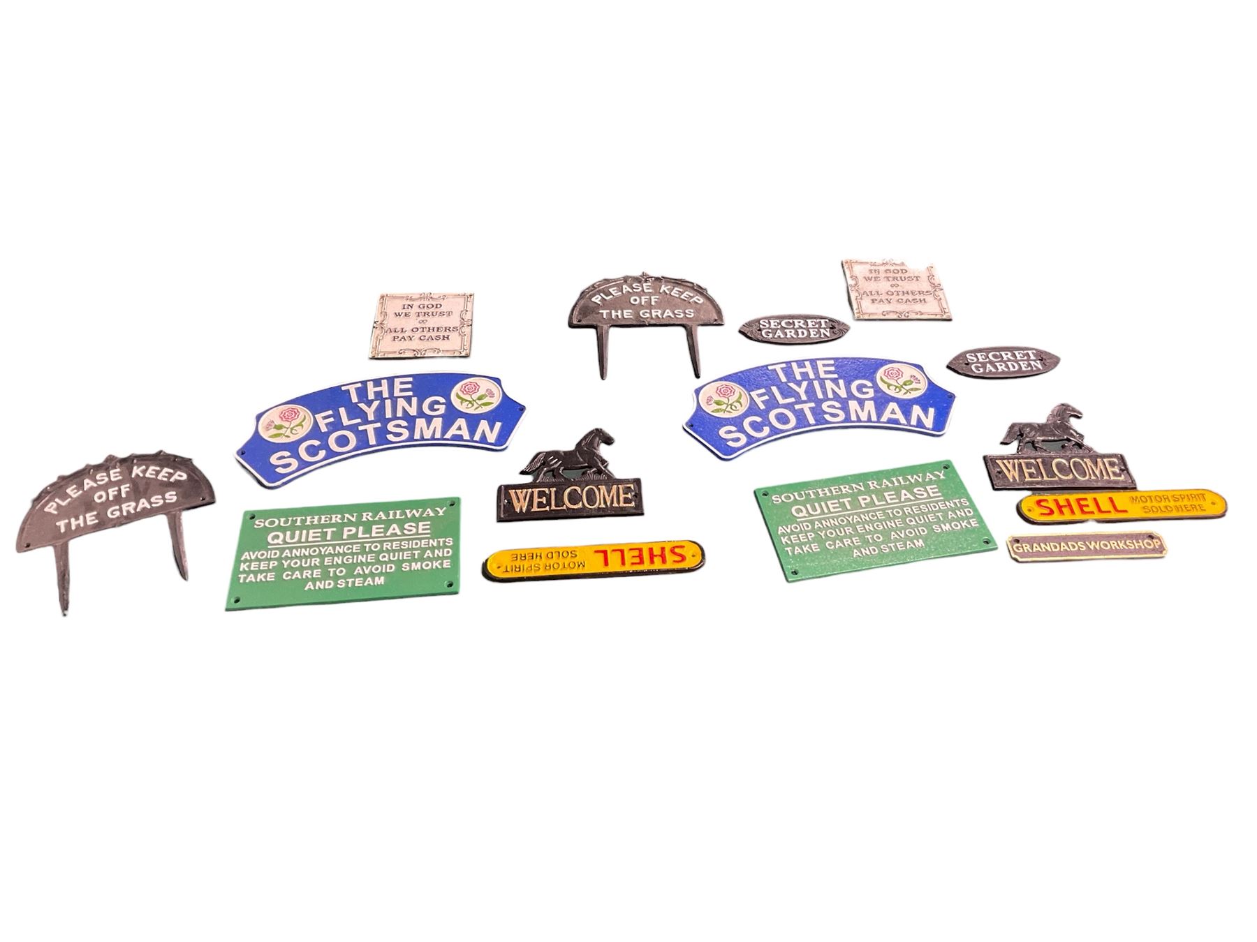 Collection of cast iron signs, including The Flying Scotsman, Quite please, Shell etc 