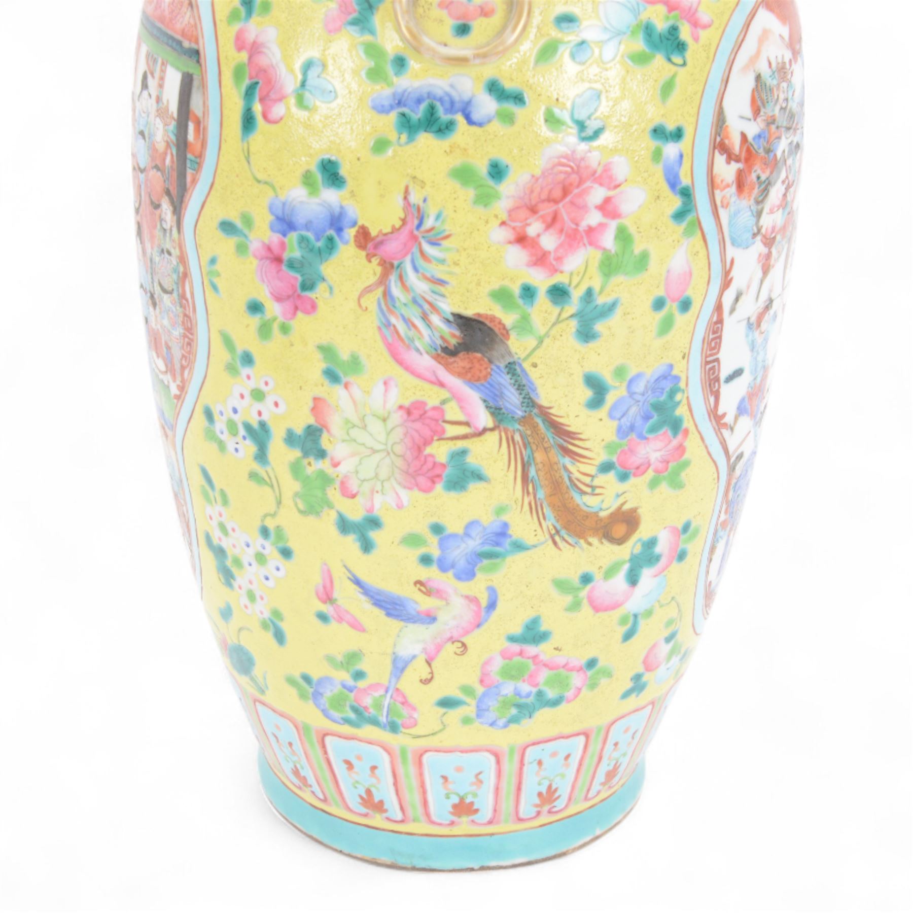 19th century Chinese famille rose yellow ground porcelain vase, of baluster form with twin applied mask ring handles, the body decorated with two shaped reserves mounted with dragon heads, depicting warriors at battle and at court, the neck with two smaller conforming figural reserves, upon a yellow ground decorated with exotic birds amidst scrolling blossom, H45.cm