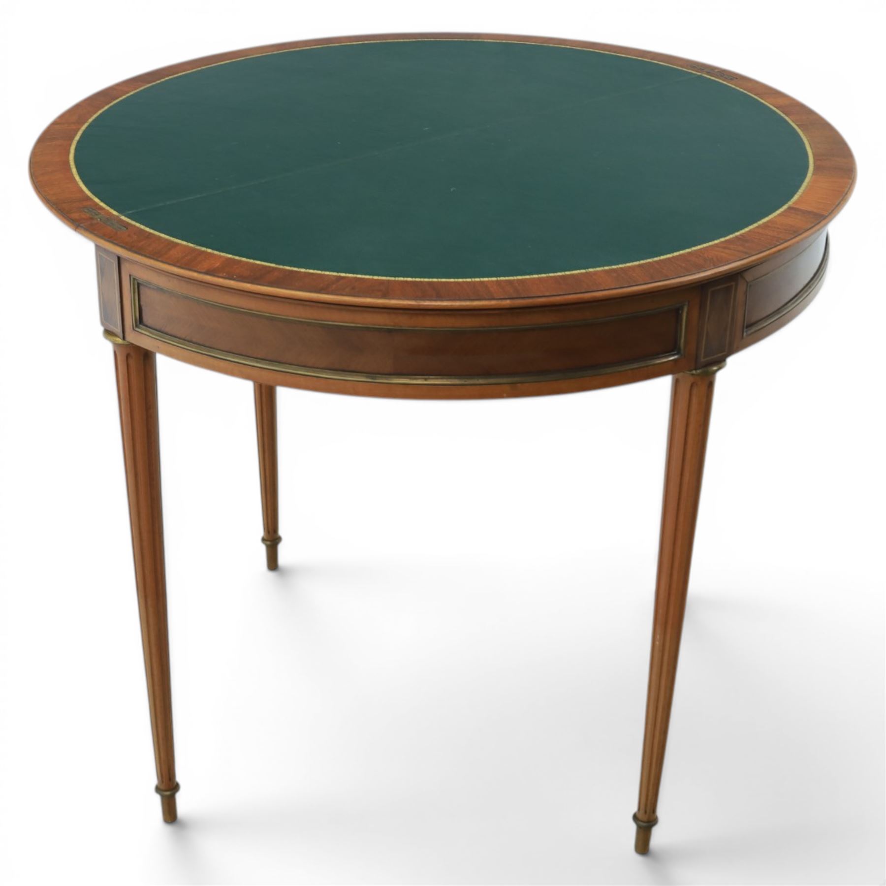 Regency revival mid 20th century walnut card table, demi lune form inlaid with boxwood, kingwood frieze with brass detail fold-over top with retractable back leg, revealing circular leather playing surface, circular tapering legs