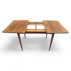 Richard Hornby for Fyne Ladye - mid-20th century afromosia teak dining table, tapered rectangular top with fluted edge and recess for spare leaf, raised on slender legs, four teak framed chairs, of ladder back design, with drop-in seat, upholstered seat, with tapered front legs and slightly raked rear legs,, table unextended width 106cm depth 79cm height 74cm with additional leaf 45cm wide- chairs width 48cm depth 41cm height 87cm 