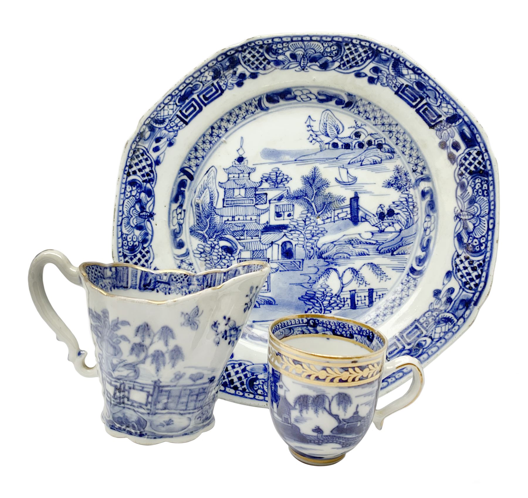 18th century Chinese blue and white porcelain plate, of octagonal form decorated with a riverside scene with pagodas, fence, and trees, within lattice and key fret detailed border, D22.5cm, together with a late 18th/early 19th century blue and white cream boat of English shape, H8.5cm, and an early 19th century Chinese blue and white coffee cup, H6cm, both decorated in riverside scenes 