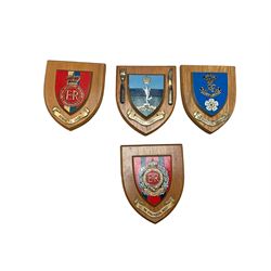 Collection of military shields and cast iron signs, including Royal Wessex Yeomanry, Royal Sussex Regiment etc 
