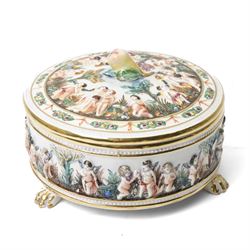 Capodimonte vase and cover decorated with a raised pattern of cherubic figures H32cm, another vases and cover with panels of figures H33cm, bowl and cover with similar decoration D20cm and two other Capodimonte pieces (5)