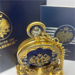 Franklin Mint House of Faberge 'The Imperial Collector Watch', the full hunter pocket watch with blue guilloche enamel and House of Faberge double eagle logo to gilded cover, opening to reveal a skeleton movement and enamel dial, upon a gilded stepped base supported by a pair of griffins, with a gilded watch chain, in original box with certificate of authenticity, including stand H14cm