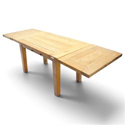 Modern solid oak extending dining table and eight upholstered chairs, the table of plank top construction raised on square supports, extended to 231cm with leaves 