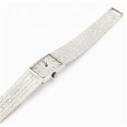Accurist ladies 9ct white gold manual wind wristwatch, silvered dial with baton hour markers, on integral 9ct bracelet, London 1969