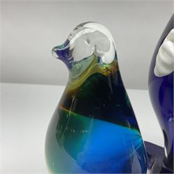Murano glass clown, together with two glass penguin paperweights, clown H28cm