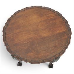 Georgian design piecrust coffee table with acanthus carved cabriole supports, seated on ball and claw feet