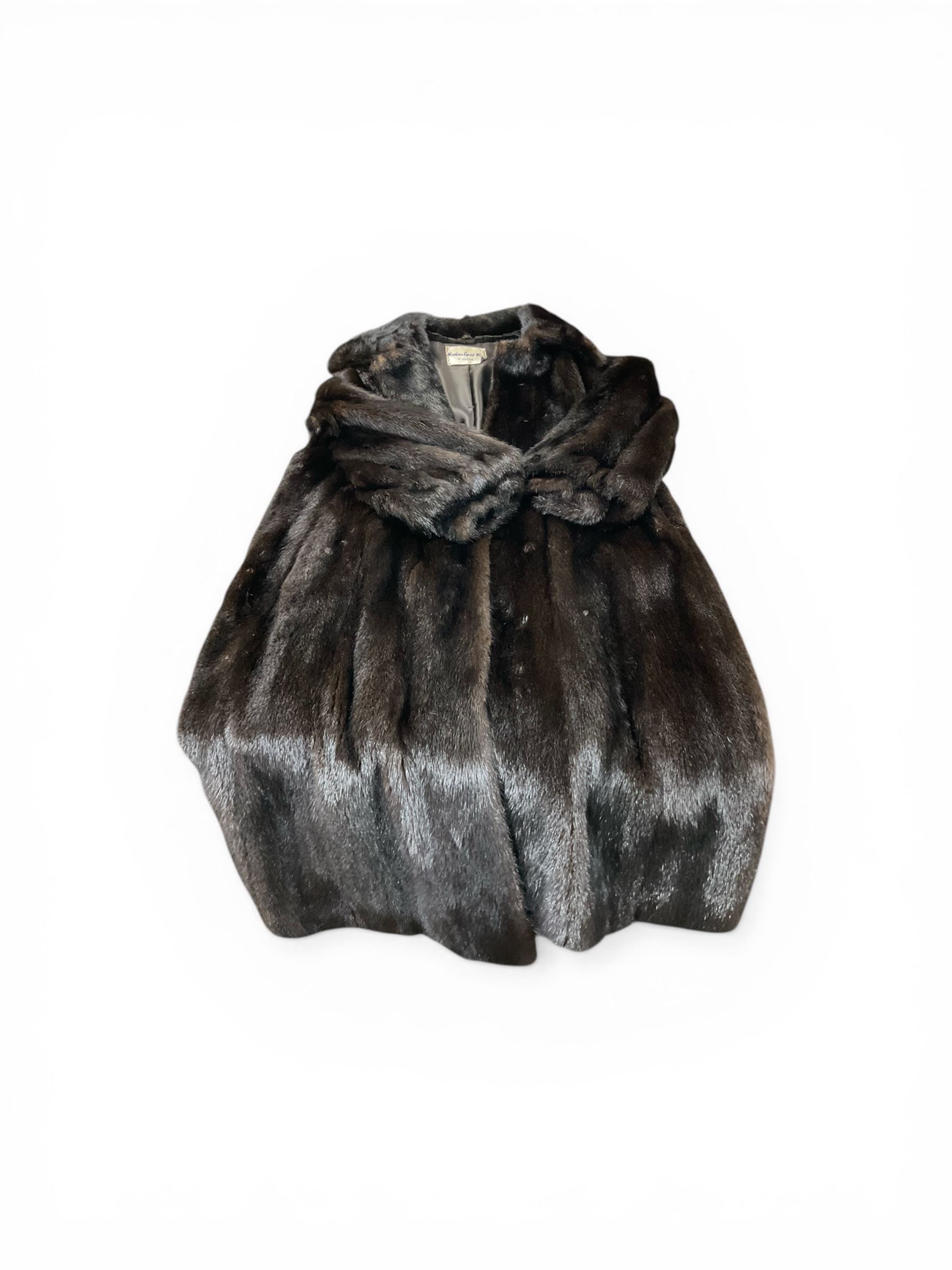 Four fur coats including two mink